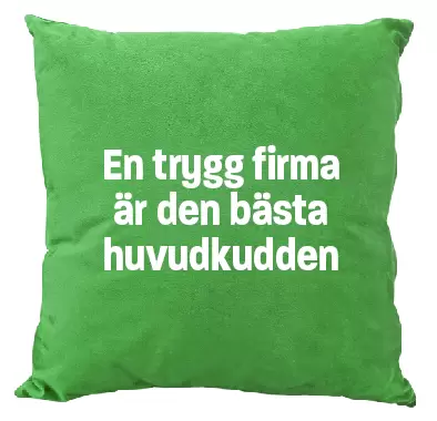 Grön kudde med texten En trygg firma är bästa huvudkudden.